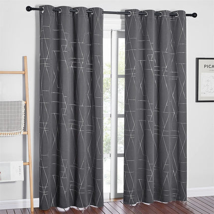 Tenda oscurante grigia motivo geometrico