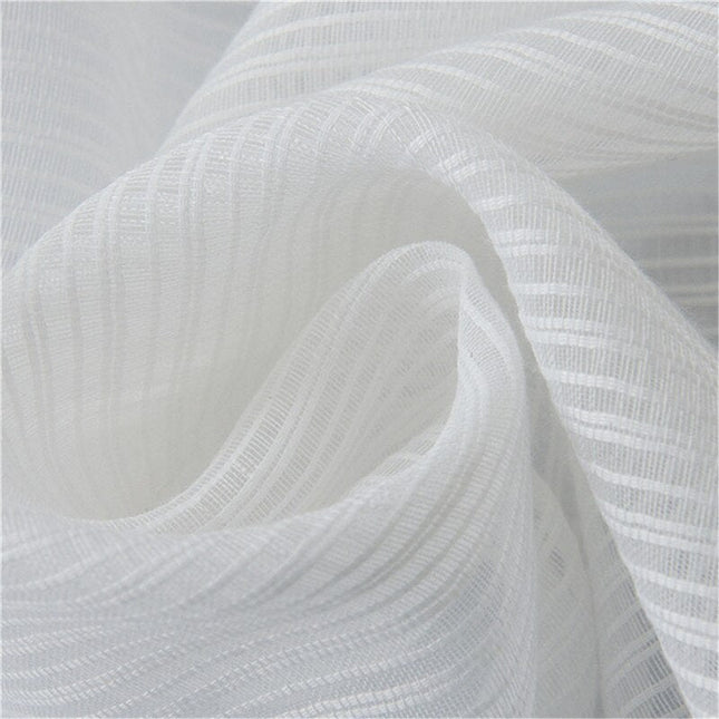 Tenda velata bianca dal tessuto testurizzato