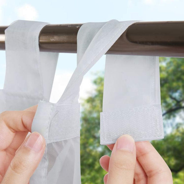 Tenda velata da esterno con anelli