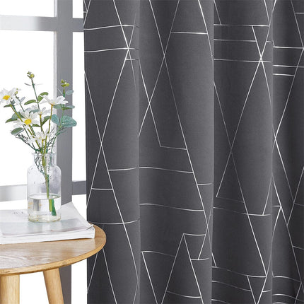 Tenda oscurante grigia motivo geometrico