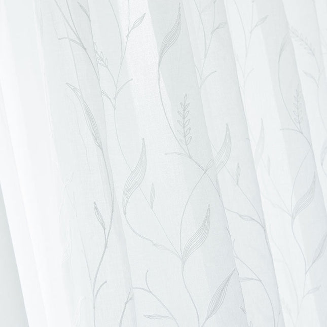 Tenda velata con delicato ricamo vegetale