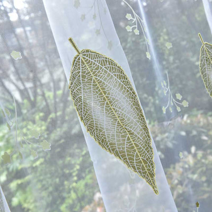 Tenda velata con foglie verdi ricamate