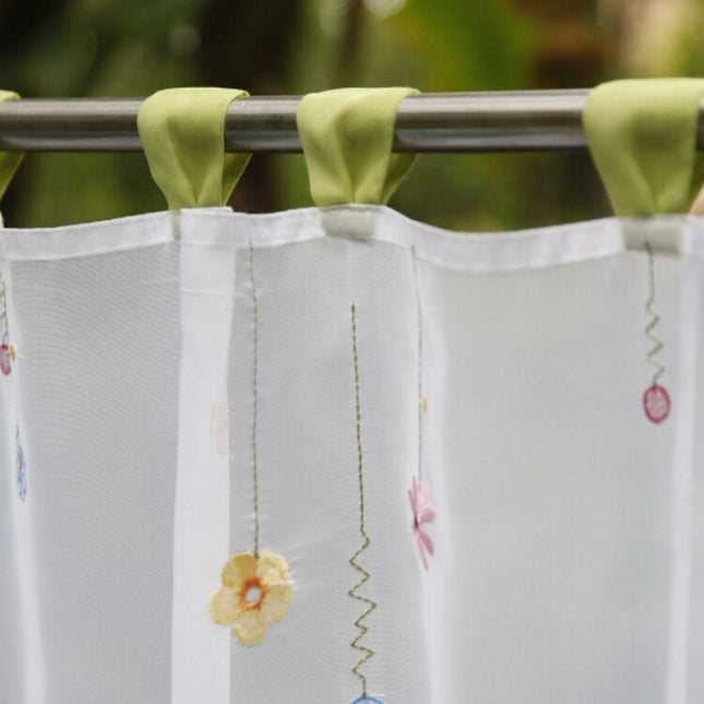 Tendina a vetro con fiori ricamati