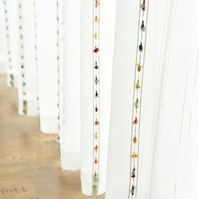 Tenda velata lino con pompon colorati