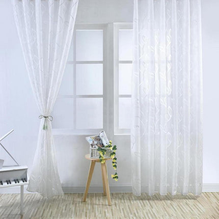 Tenda velata bianca con ricamo foglie