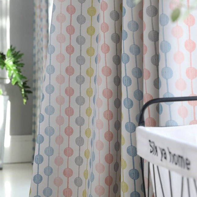 Tenda rosa a pois colorati