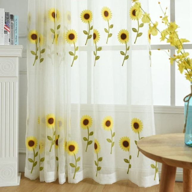 Tenda velata ricamata con girasoli