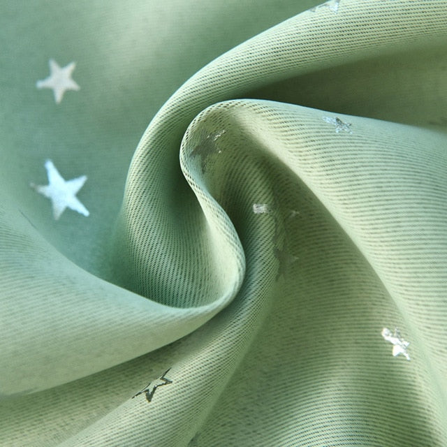 Tenda oscurante verde con stelle