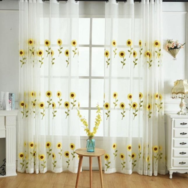 Tenda velata ricamata con girasoli