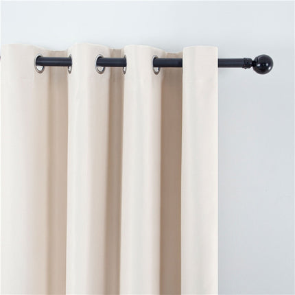 Tenda oscurante termica beige con anelli