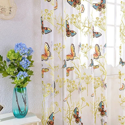 Tenda velata con farfalle colorate ricamate