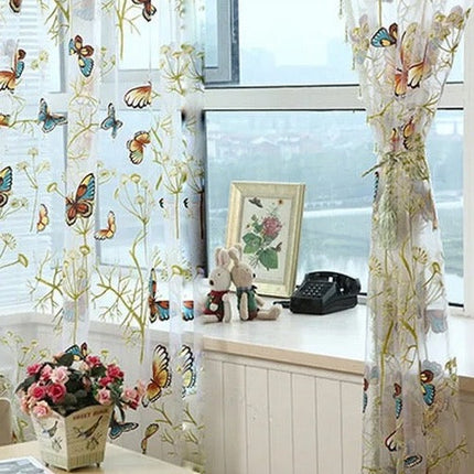 Tenda velata con farfalle colorate ricamate