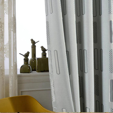 Tenda Oscurante Grigia con Design Geometrico