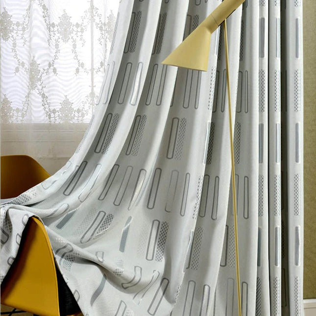 Tenda Oscurante Grigia con Design Geometrico