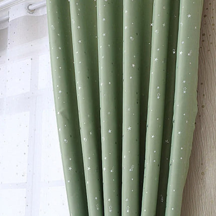 Tenda oscurante verde con stelle