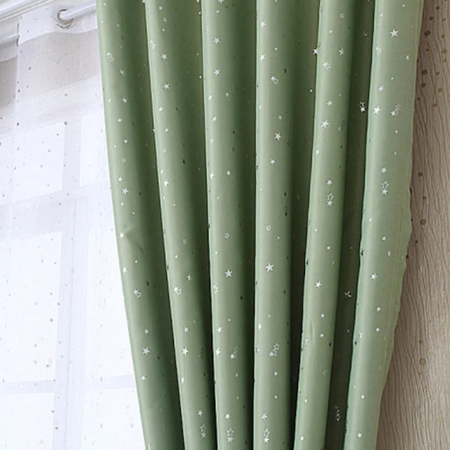 Tenda oscurante verde con stelle